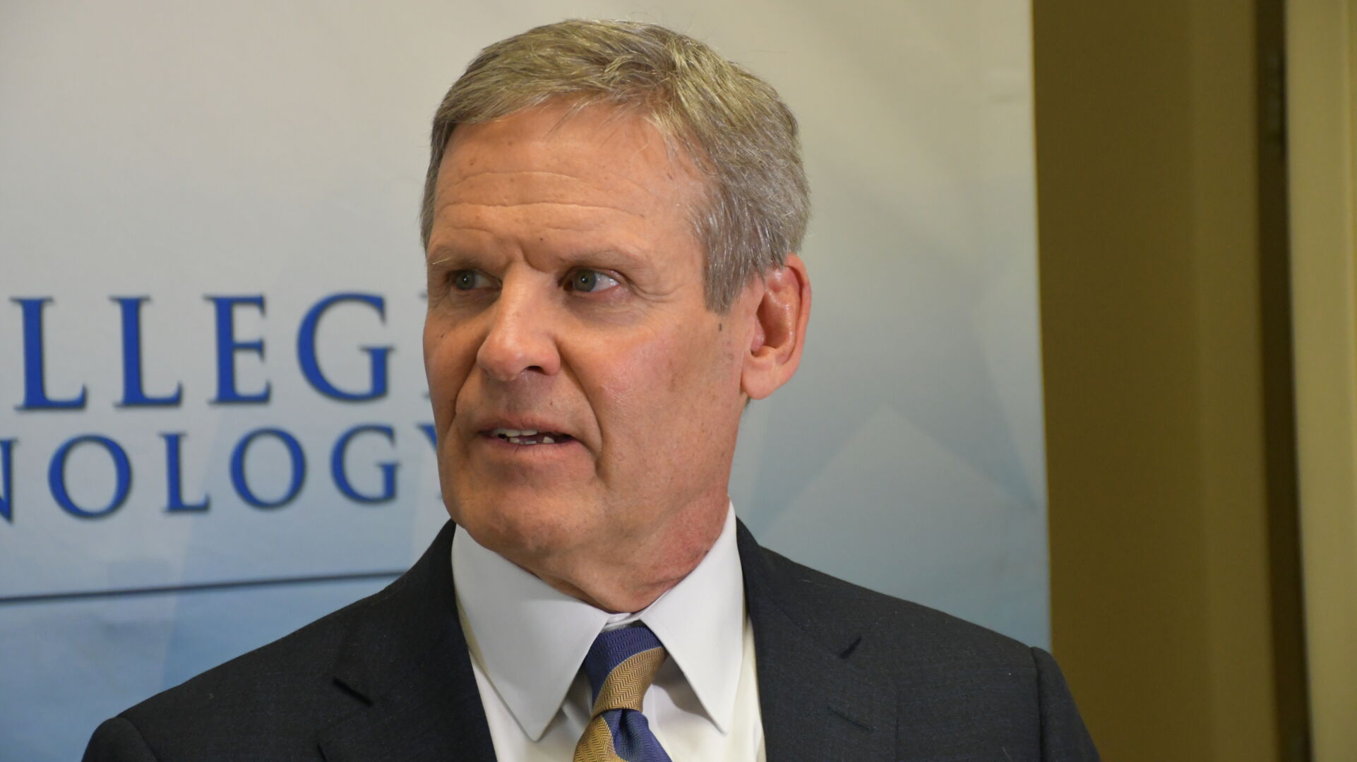 Bill Lee talks to reporters